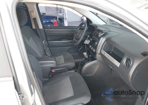 2015 Jeep Compass Sport z USA, uszkodzony, nr VIN 1C4NJCBA2FD156097